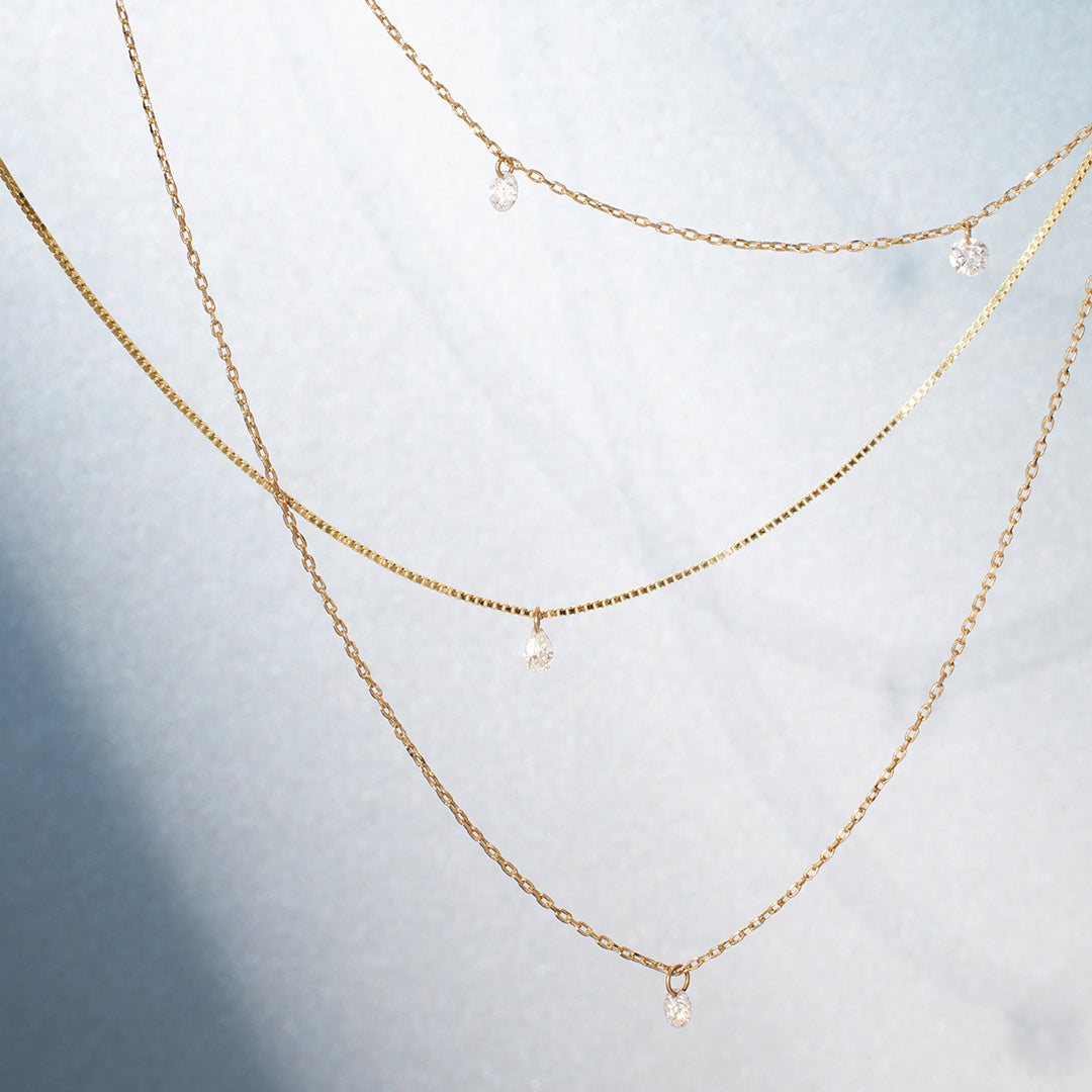 CHASSE | Pear Shape Floating Diamond Necklace