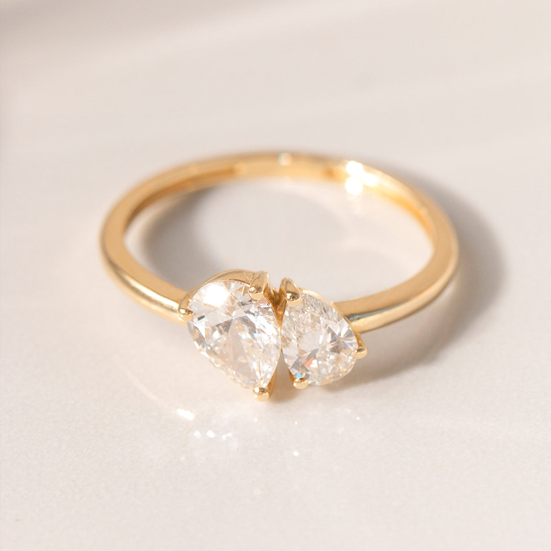 Anniversary gift idea: 14K gold infinity ring with pear-shaped lab-grown diamonds in elegant box