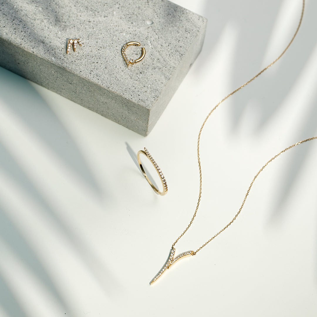 LOU | White Sapphire Swirl Clicker Hoop