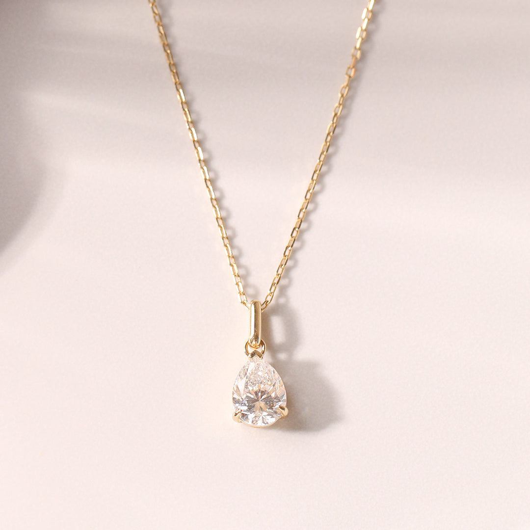Single pear-shaped lab diamond pendant on fine 14K gold chain, timeless and refined