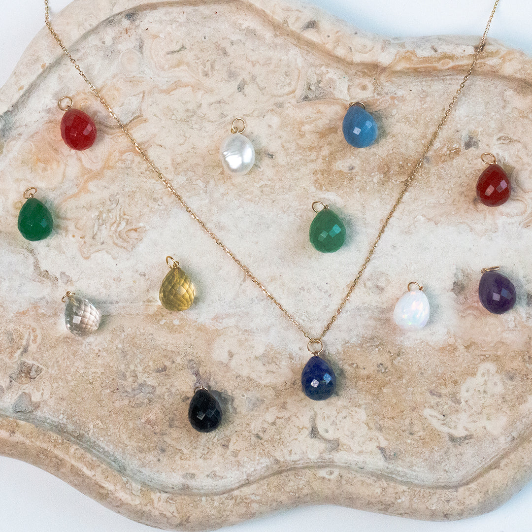 Solid gold chain with charm holder and natural gemstone