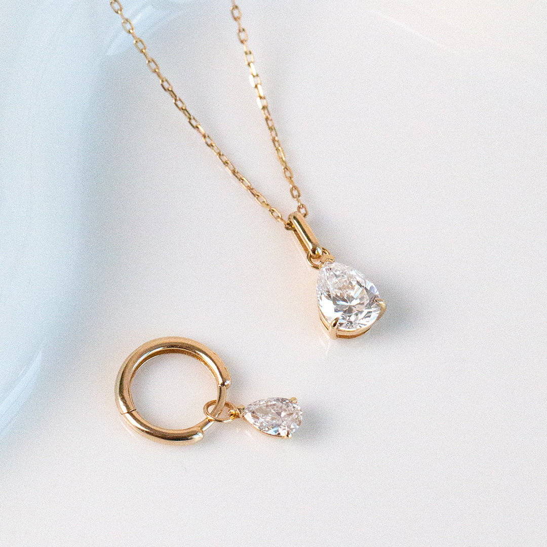 Minimalist pear lab-grown diamond necklace, ideal for layering with your favorite neck mess