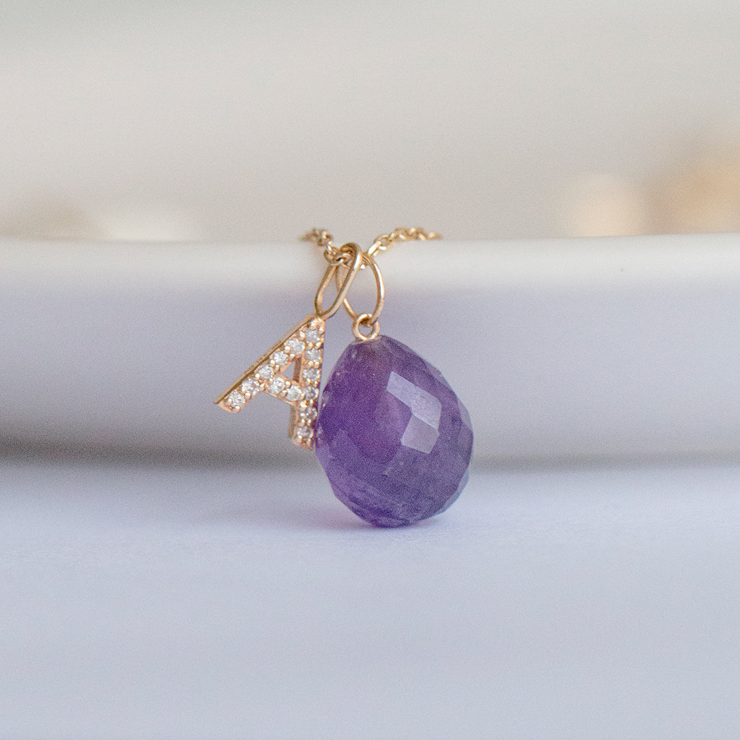 Healing crystal charm with gold letter charm