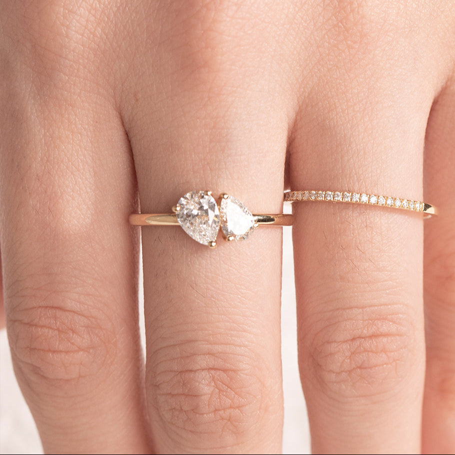 14K gold infinity ring with two pear-shaped lab-grown diamonds, symbolizing eternal love
