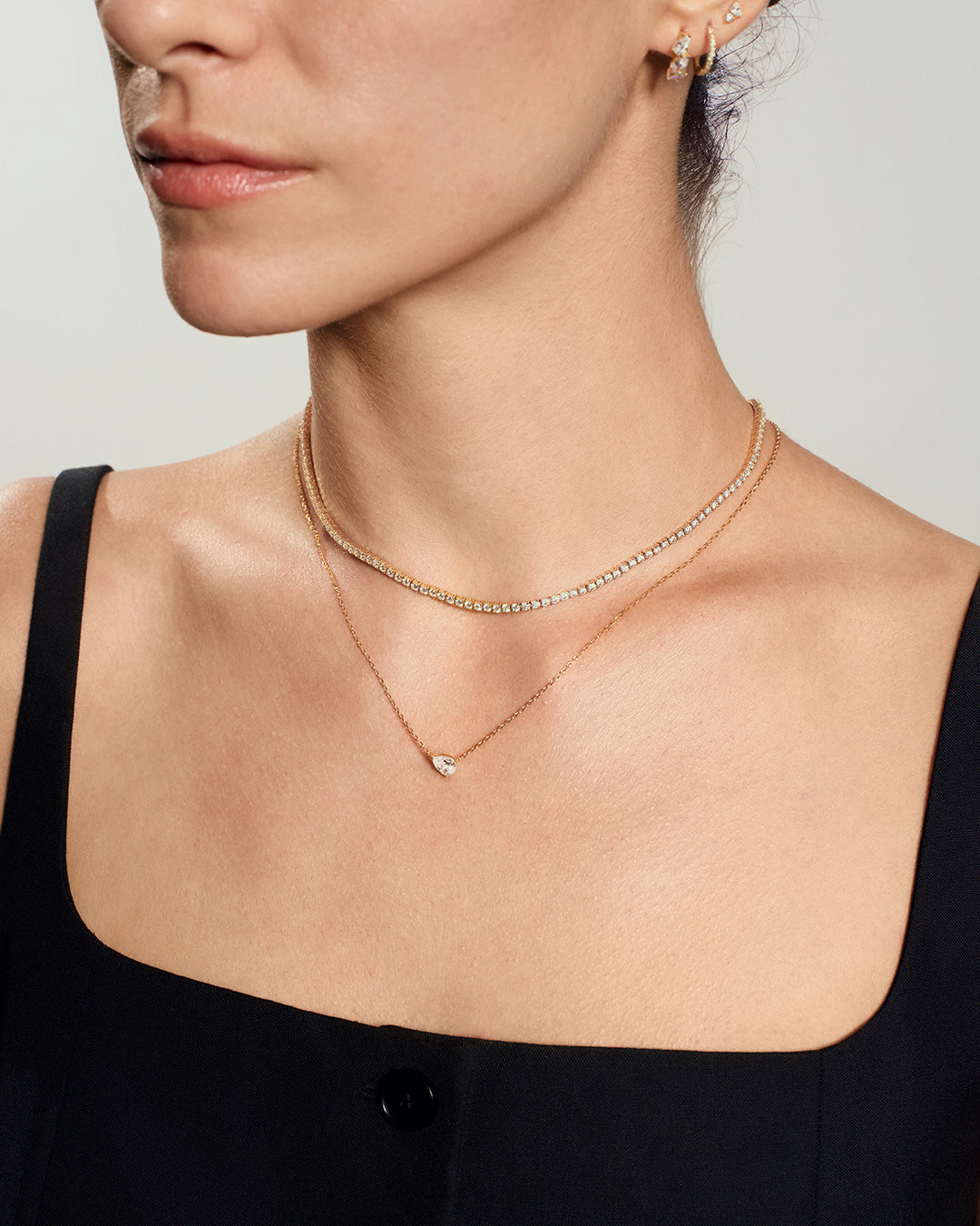 Solitaire Pear Lab Grown Diamond Necklace close-up on model