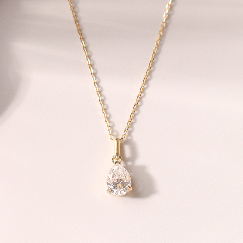 Single pear-shaped lab diamond pendant on fine 14K gold chain, timeless and refined
