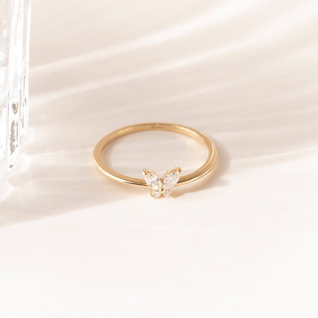 Delicate butterfly ring crafted in 14K gold, featuring marquise and round lab-grown diamonds