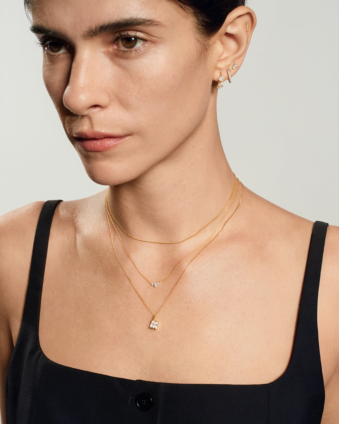 14K Gold Initial Lab-Grown Diamond Charm close-up on model
